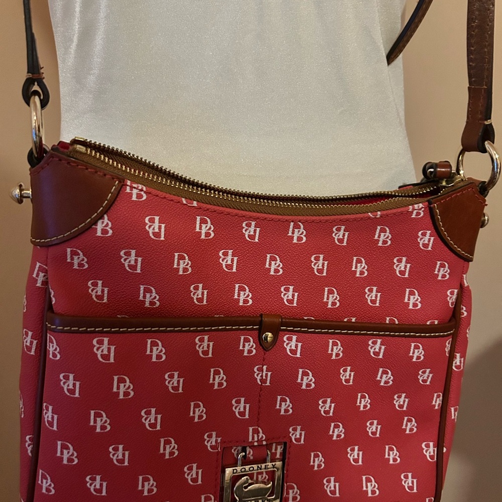 Dooney & Bourke Red and Brown Crossbody Bag with Iconic Logo Pattern